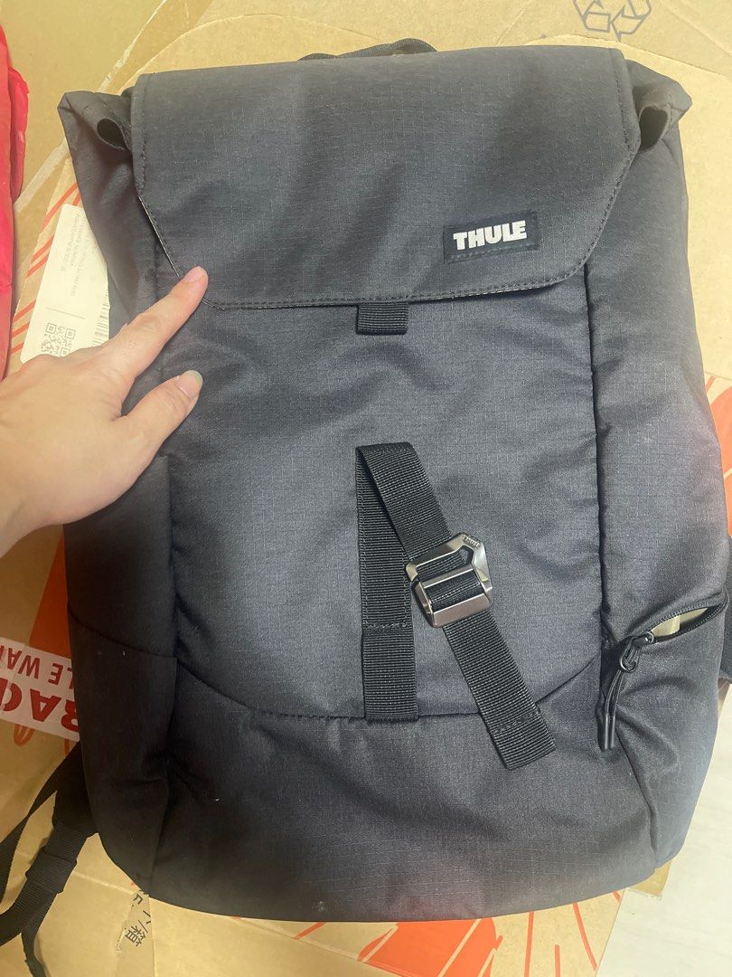 Thule Backpack (Category: Backpacks) located in Singapore. Submitted by carol.kohchujun (Listing ID 1383017565, Image 1). Description: Features a flap closure and a side pocket. Perfect for everyday use or travel. Durable and well-designed, offering both functionality and a sleek look. Great for carrying essentials. Use during part time studies 2 years back. Fast deal at $25.