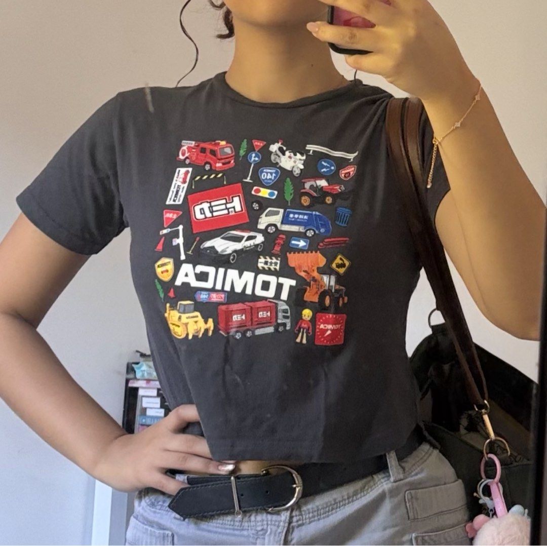 tomica graphic baby tee (Category: Shirts) located in Paranaque City. Submitted by lovedbydevi (Listing ID 1383021170, Image 1). Description: kids size, but fits comfortably on a size s no cracks on the print shipping via jnt.