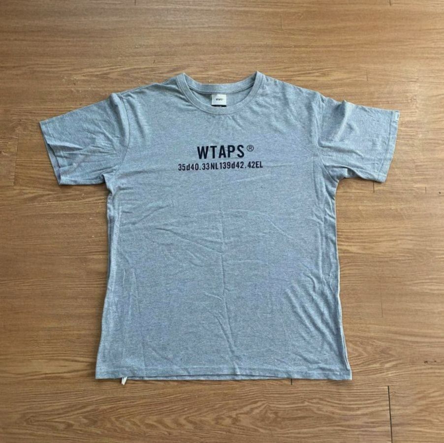 WTAPS GPS Tee (Category: Tshirts & Polo Shirts ) located in Manila. Submitted by Prevtheque (Listing ID 1383013050, Image 1). Description: Grey short sleeve with GPS coordinates graphic on the chest W-23" L-27.5" .