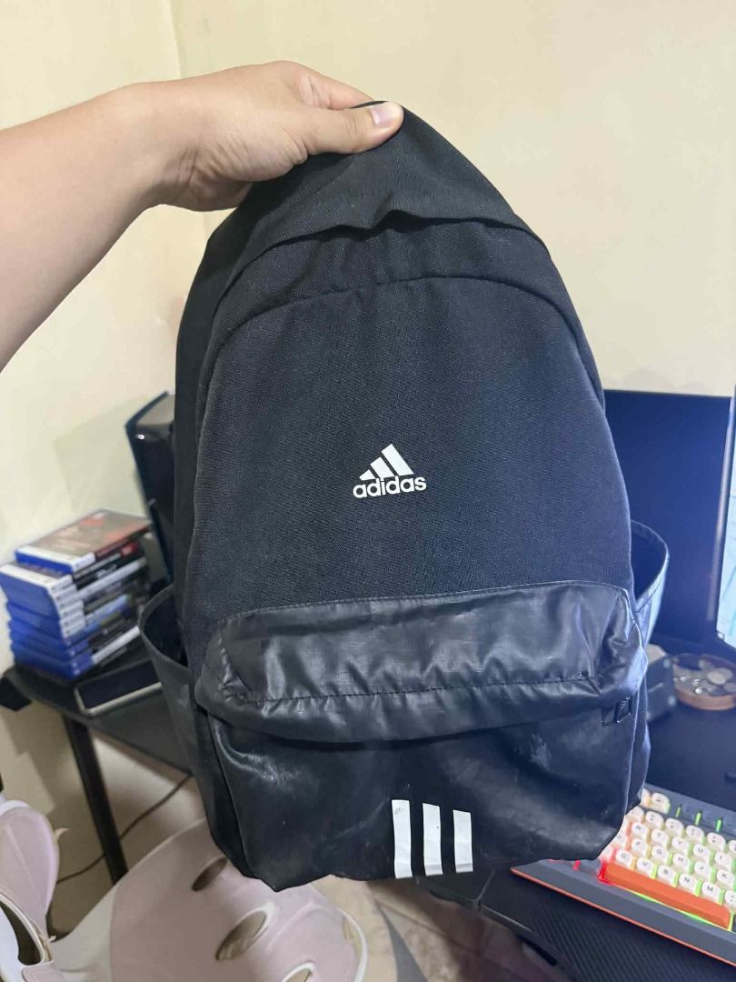 Adidas Backpack 20L (Category: Backpacks) located in Manila. Submitted by smcstllo24 (Listing ID 1383183975, Image 1). Description: Adidas Backpack 20L ₱799 Sign of usage sa front/main compartment and side pockets. No damage, tear or any other issue. RFS: Gifted a new gym bag, disposing this. PRICE: ₱900 💰 LOC: Taytay, Rizal 📌.