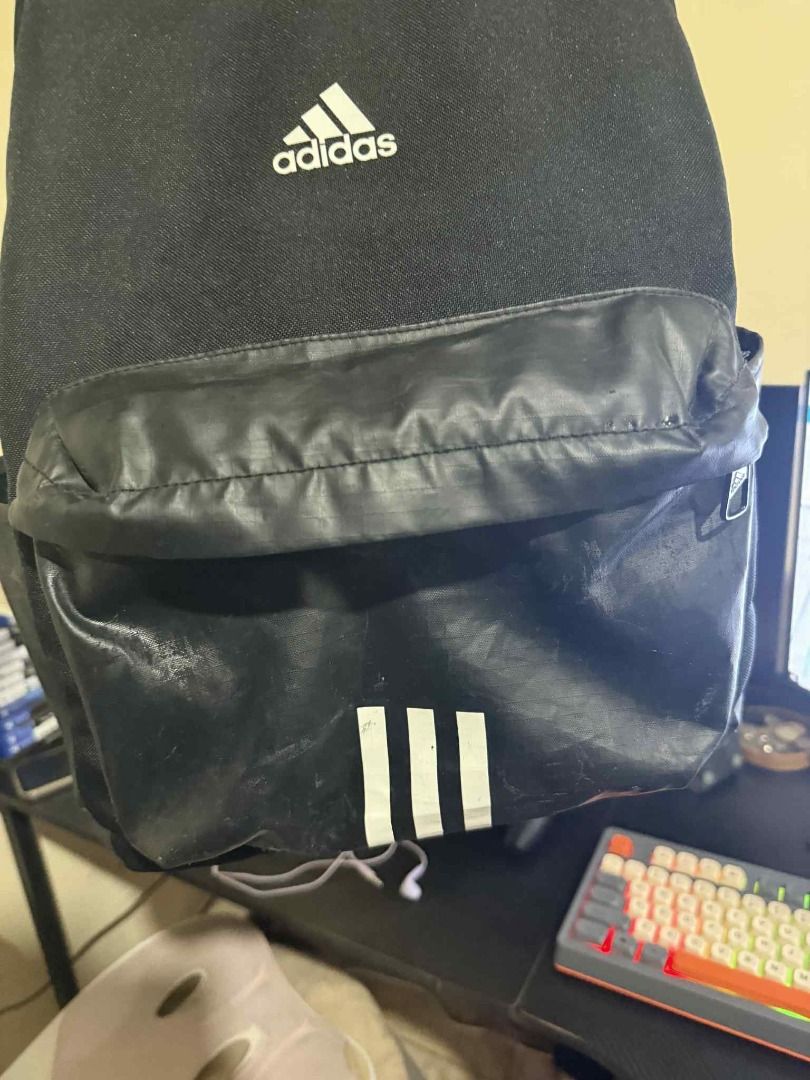Adidas Backpack 20L (Category: Backpacks) located in Manila. Submitted by smcstllo24 (Listing ID 1383183975, Image 2). Description: Adidas Backpack 20L ₱799 Sign of usage sa front/main compartment and side pockets. No damage, tear or any other issue. RFS: Gifted a new gym bag, disposing this. PRICE: ₱900 💰 LOC: Taytay, Rizal 📌.