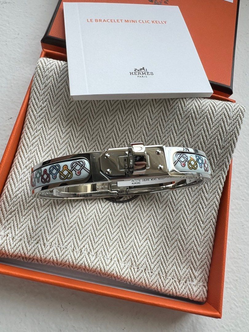 Authentic Hermes Mini Clic Kelly Bracelet Aurore PHW (Category: Luxury Accessories) located in Quezon City. Submitted by breakmyfashion (Listing ID 1383169082, Image 1). Description: Comes in full set with receipt, box, paperbag and dust bag. .