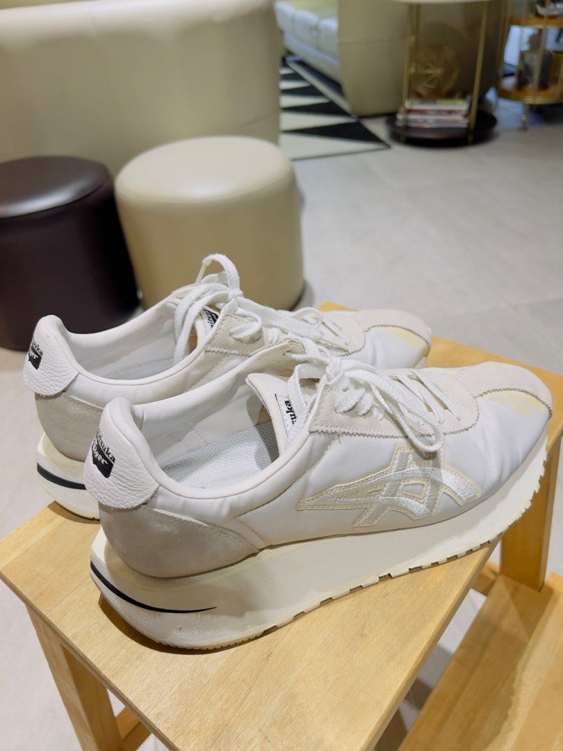 Authentic Onitsuka Tiger White Sneakers (Category: Sneakers) located in Pasig City. Submitted by ryester (Listing ID 1383164974, Image 2). Description: Authentic item. Lightly used, but there is yellowing on the front part due to the glue used. See pics. .