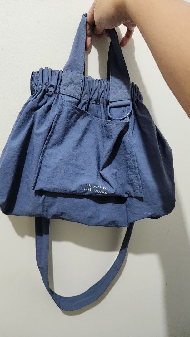 Beyond the Vines Dumpling Bag in XS size (Category: Cross-body Bags) located in Manila. Submitted by pshopper (Listing ID 1383258003, Image 1). Description: btv tote bag in medium size and blue color well used and fits sooo much stuff needs cleaning too minor flaw: small chipping at the hardware connecting the bag and strap.