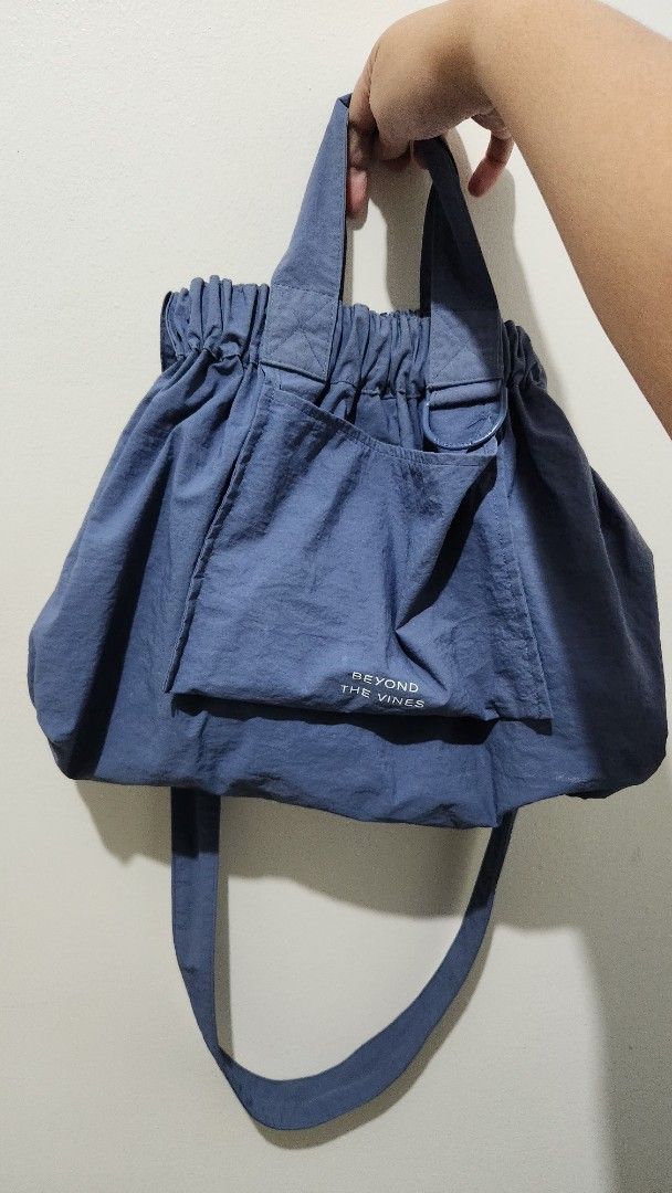 Beyond the Vines Dumpling Bag in XS size (Category: Cross-body Bags) located in Manila. Submitted by pshopper (Listing ID 1383258003, Image 2). Description: btv tote bag in medium size and blue color well used and fits sooo much stuff needs cleaning too minor flaw: small chipping at the hardware connecting the bag and strap.