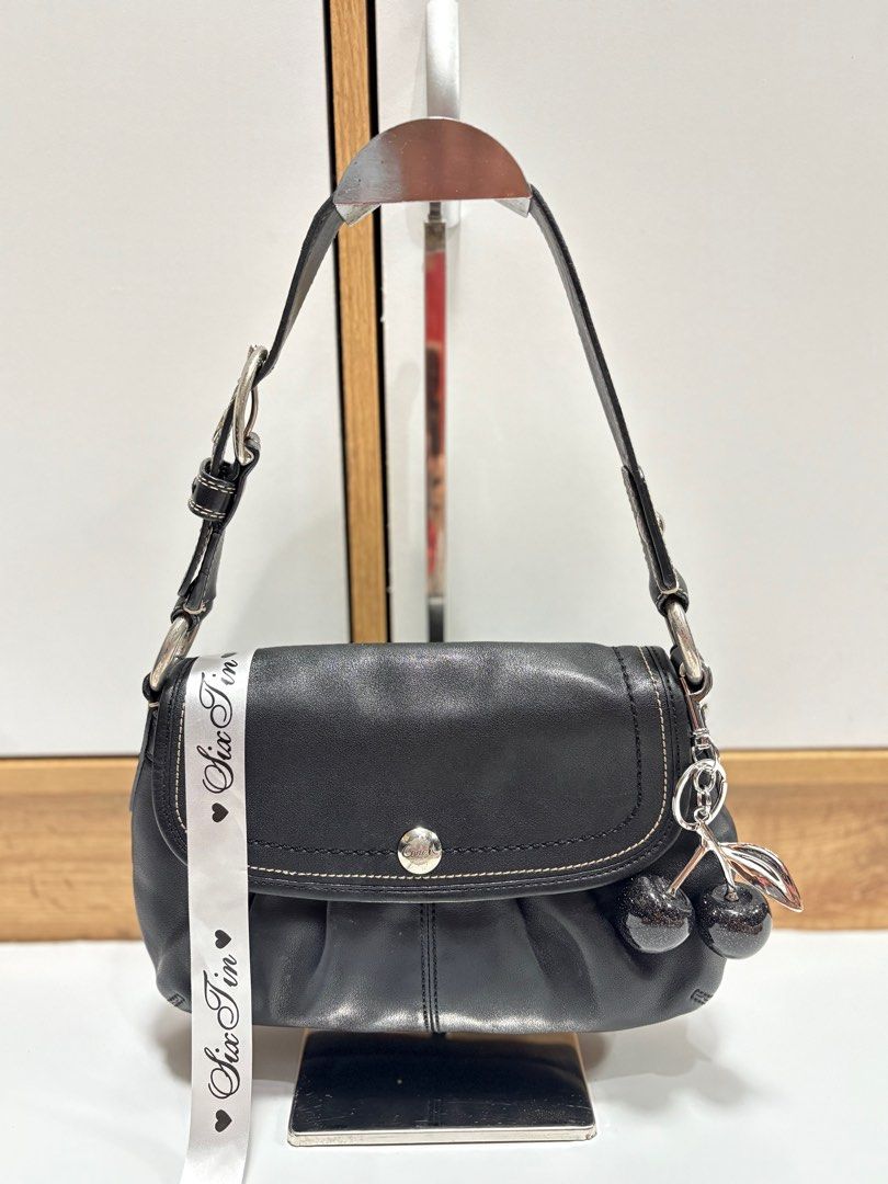 Coach mini soho (Category: Luxury Bags & Wallets) located in Bacoor. Submitted by sixtin_ (Listing ID 1383200575, Image 1). Description: Rank B Good condition Minimal sign of usage No hangtag Free bag charm.