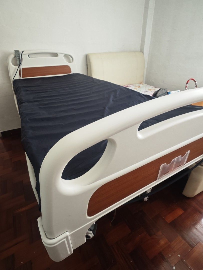 Electric Adjustable Hospital Bed. As good as new.