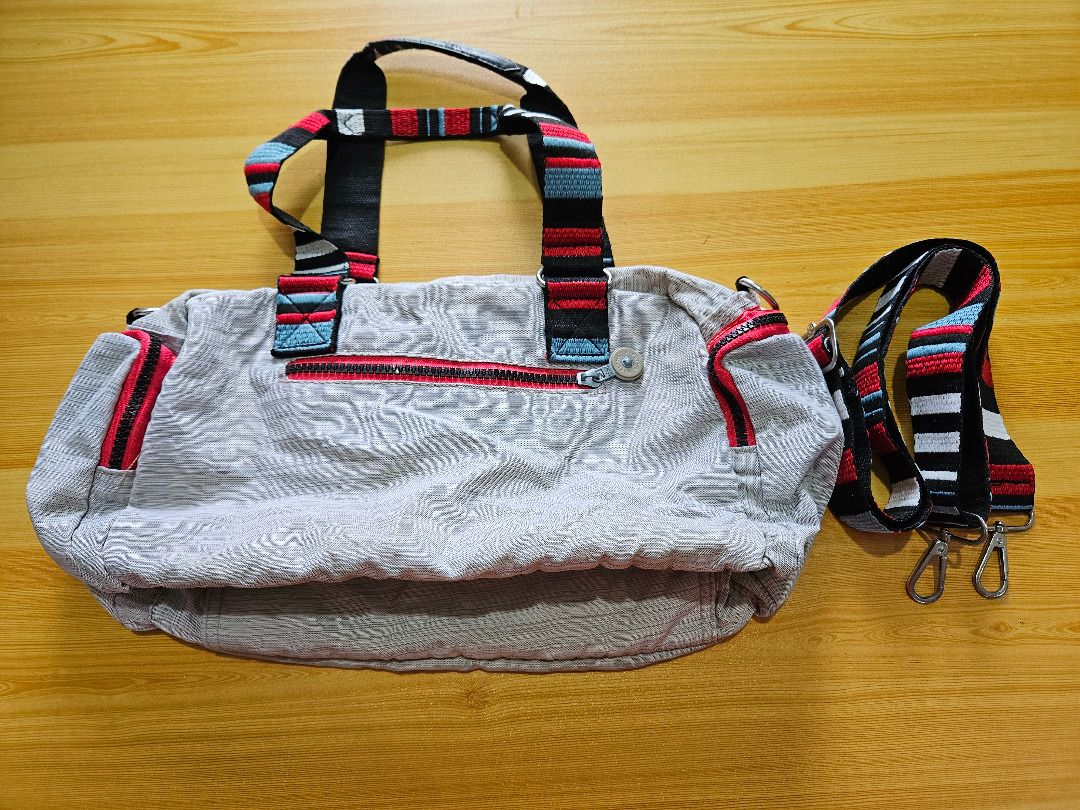 Gray Kipling Bag (Category: Clutches) located in Cainta. Submitted by eesoj (Listing ID 1383113467, Image 2). Description: For sale is a Gray Kipling Bag. RFS: Decluttering -No tears/defects -Price is negotiable.