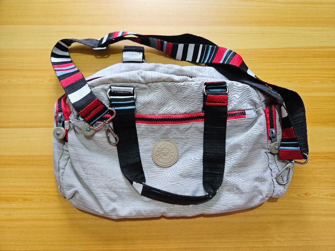 Gray Kipling Bag (Category: Clutches) located in Cainta. Submitted by eesoj (Listing ID 1383113467, Image 1). Description: For sale is a Gray Kipling Bag. RFS: Decluttering -No tears/defects -Price is negotiable.