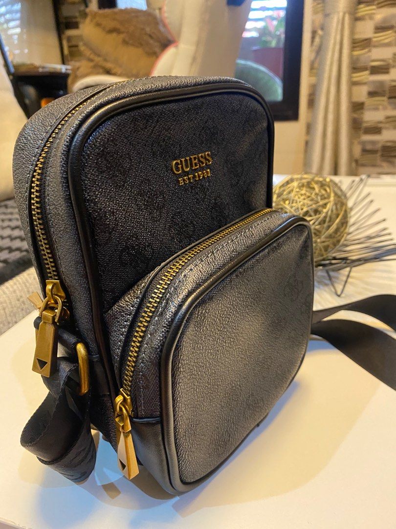 GUESS ORIGINAL CROSS BODY BAG (Category: Luxury Bags & Wallets) located in Las Pinas. Submitted by ghostkey (Listing ID 1383094122, Image 1). Description: GUESS ORIGINAL CROSS BODY BAG .