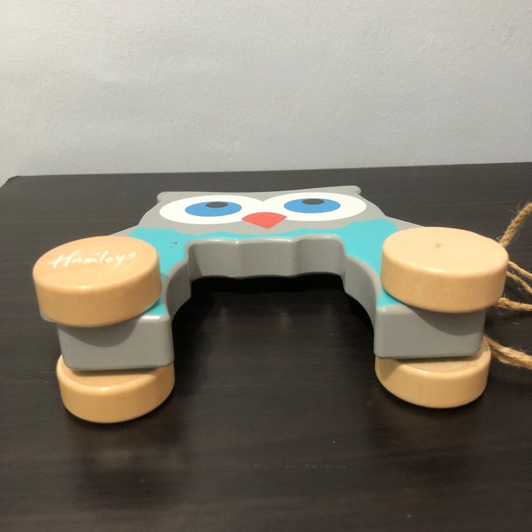 Hamleys Owl Pull Along (Category: Infant Playtime) located in Imus. Submitted by dyelinn (Listing ID 1383223209, Image 3). Description: Flaws: Minimal scratches, wood chip on one wheel, jute/abaca string.