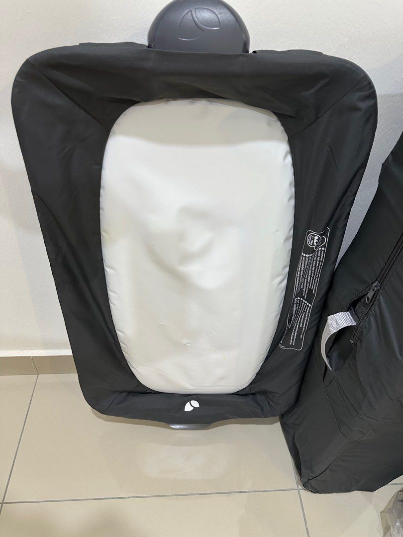 Joie Commuter Change Travel Cot (Category: Cots & Cribs) located in Labu. Submitted by kenny2silva (Listing ID 1383260129, Image 2). Description: Utilised 7 months or less. No obvious staining. Nothing broken. Almost new. Cot comes complete with travel bag and diaper station. 2 level feature. Newborn up to 15 kgs. .