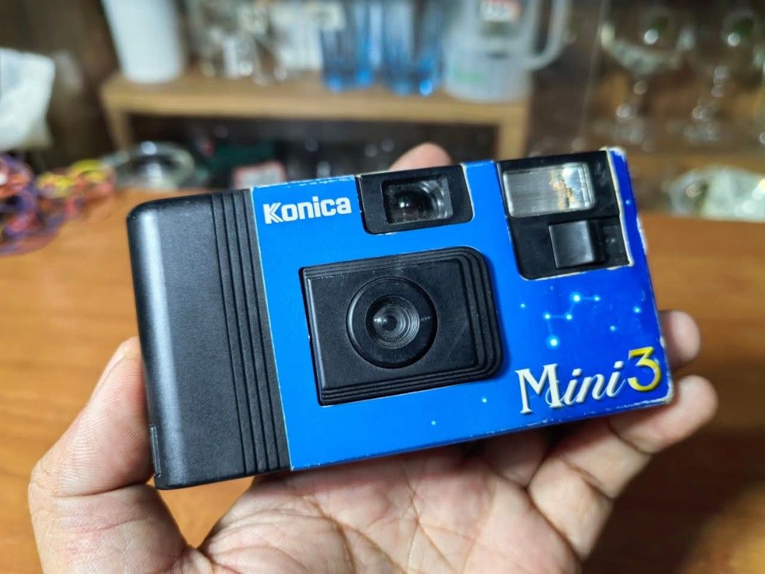 Konica Mini 3 Disposable Camera (Category: Cameras) located in Cebu City. Submitted by dudes_villanueva (Listing ID 1383225392, Image 2). Description: Konica Mini 3 📌35mm disposable film camera produced by Konica, a Japanese manufacturer that merged with Minolta in 2003. 📌It is a simple point-and-shoot camera, easy to use for beginners. 📌Features a fixed-focus lens and a built-in flash for low-light conditions. 📌It uses 35mm film, which needs