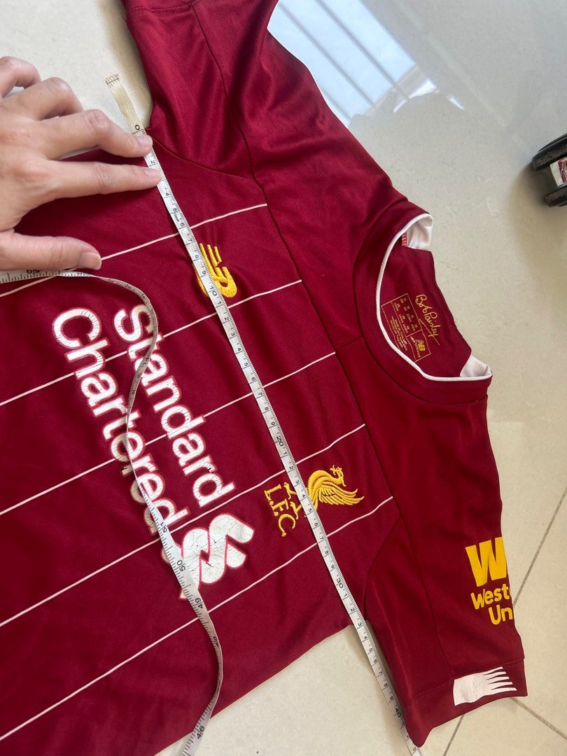 Liverpool red kids jersey -4yr boy (Category: Babies & Kids Fashion) located in Singapore. Submitted by citruspulp (Listing ID 1375940684, Image 2). Description: Size 18 Ptp 33cm Length 45cm.