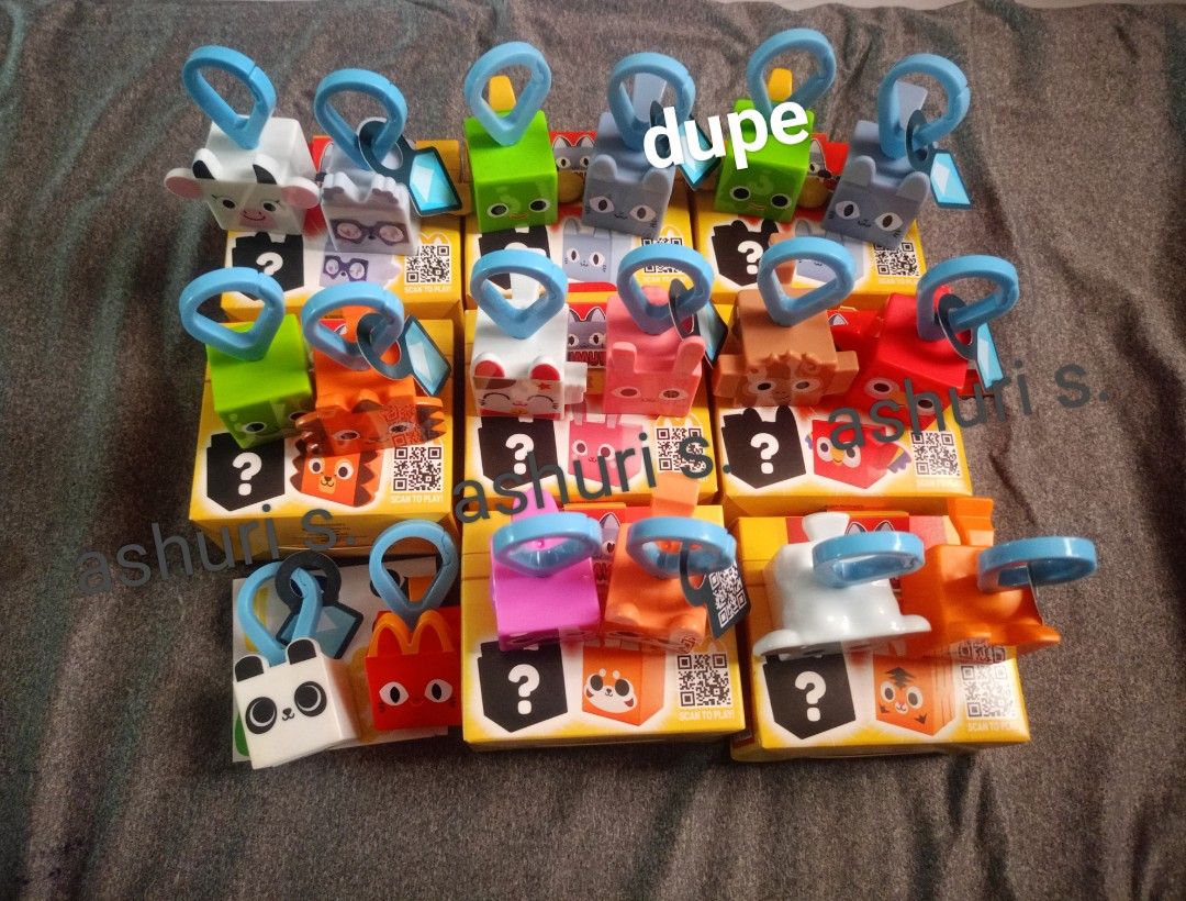 Take All: McDo Pet Simulator Happy Meal Toy (Category: Designer & Blind Box Toys) located in Taguig. Submitted by ashiieewazzup (Listing ID 1383094294, Image 2). Description: Decluttering! 📌9 sets of pet sim toy 📌dupe (cat & duck) 📌1 no box (McDo cat & Panda) 📌missing in set: Kawaii cat & ?, shark & otter 📌complete stickers and qr code 📌FOR TAKE ALL ONLY 📌Taguig City shipping shouldered by the buyer..