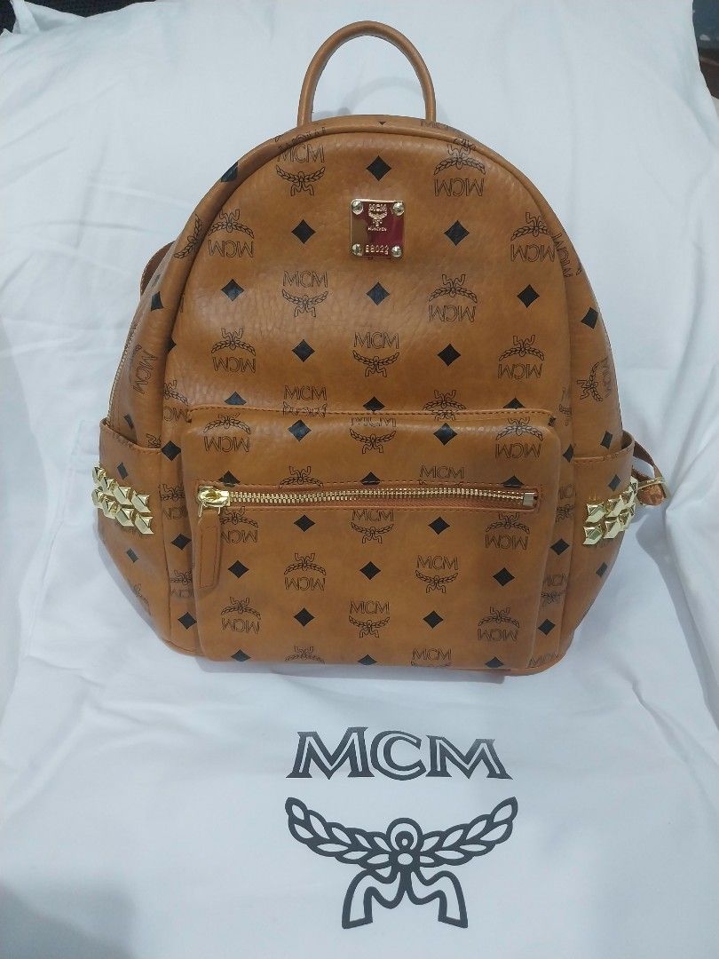 MCM STARK SIDE STUDS Backpack (Category: Backpacks) located in Quezon City. Submitted by jonvee2000 (Listing ID 1383156729, Image 1). Description: Preloved ykk zipped sign of usage only at handle but still intact medium size hardwares excellent condition turnable screw.