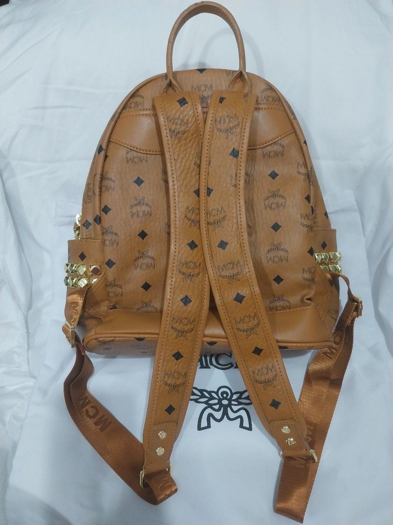 MCM STARK SIDE STUDS Backpack (Category: Backpacks) located in Quezon City. Submitted by jonvee2000 (Listing ID 1383156729, Image 3). Description: Preloved ykk zipped sign of usage only at handle but still intact medium size hardwares excellent condition turnable screw.