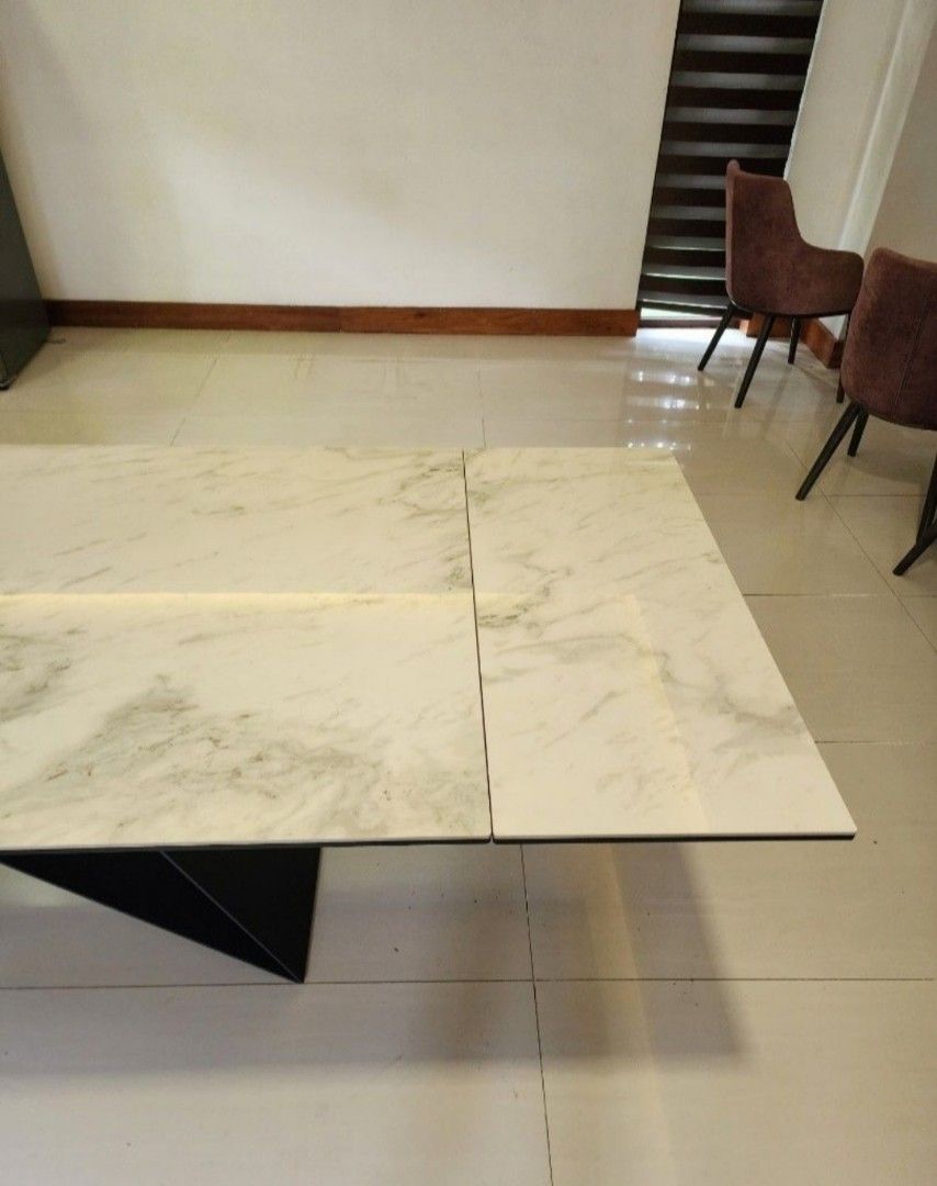 MJM Furniture: Westyn Carrera Ceramic Extendable Dining Table (Category: Tables & Sets) located in Manila. Submitted by lachinitasph_ (Listing ID 1383090454, Image 3). Description: bought for 200k+ inclusive of freight cost and tax 8-10 seater dining table can actually pass as bnew used less than a year only.