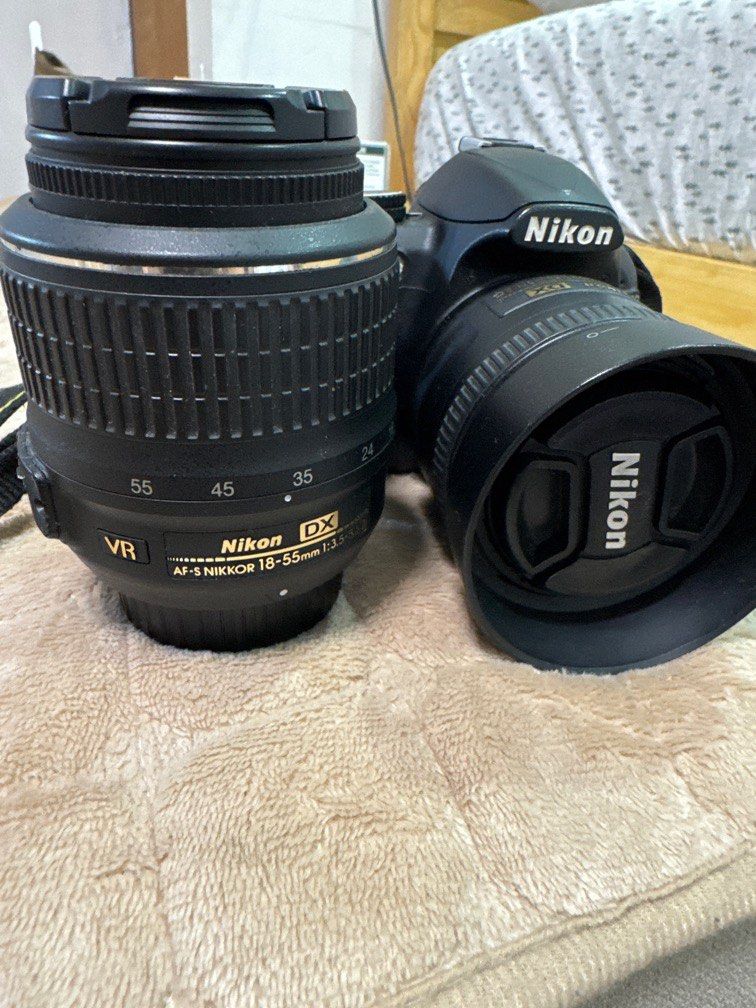 Nikon D3100 with Nikkor 35mm (Category: Cameras) located in Mandaluyong City. Submitted by xtian123 (Listing ID 1383115564, Image 2). Description: Included na yung 18-55mm kit lens pero parang may problem di nag aauto. Inclusions D3100 Body with Nikon Strap Nikkor 35mm Nikon Bag 1 Battery Kingston 16Gb Class 10 U10 (Missing Batrery Charger) mura lang naman shapi .