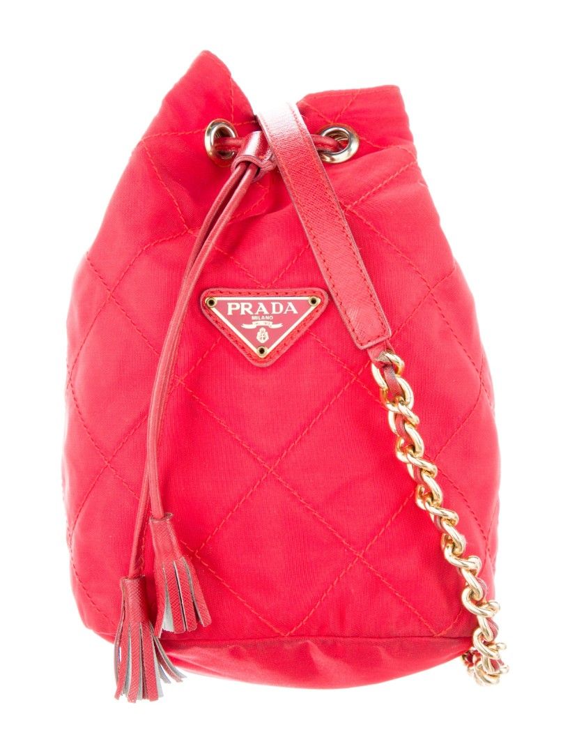 Prada Vintage Bucket Mini Sling Chain Bag (Category: Luxury Bags & Wallets) located in Cotabato. Submitted by junyamafia (Listing ID 1383094667, Image 1). Description: Tag #2 Made in Italy Super cute! Always in style! Light weight n easy to clean No ripped no tear In a good condition, might need a bit of cleaning on the edges Measurements ( Approximately) Height: 7” Width: 5.9” Length: 3.9” Strap: 16-22” 100% authentic, bought in 2nd hand shop in