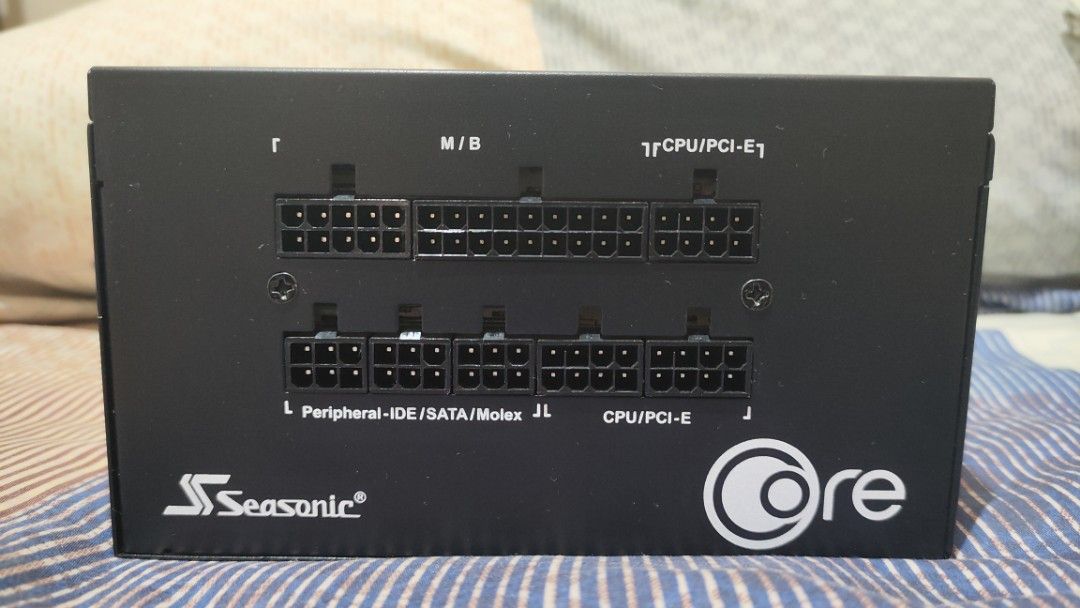 Seasonic Core GX-550 80 Plus Gold PSU (Category: Desktops) located in Paranaque City. Submitted by steeb123 (Listing ID 1383082133, Image 3). Description: Seasonic 550W ATX 80 Plus Gold power supply Used for 2+ years In good condition, no issues Complete cables Inclusions: Seasonic Core GX-550 24 pin motherboard cable 8 pin CPU cable 8+6 pin PCIE/GPU cable Molex connector 2x SATA power cables Power cord PSU tester 3x Velcro straps Screws + ziptie