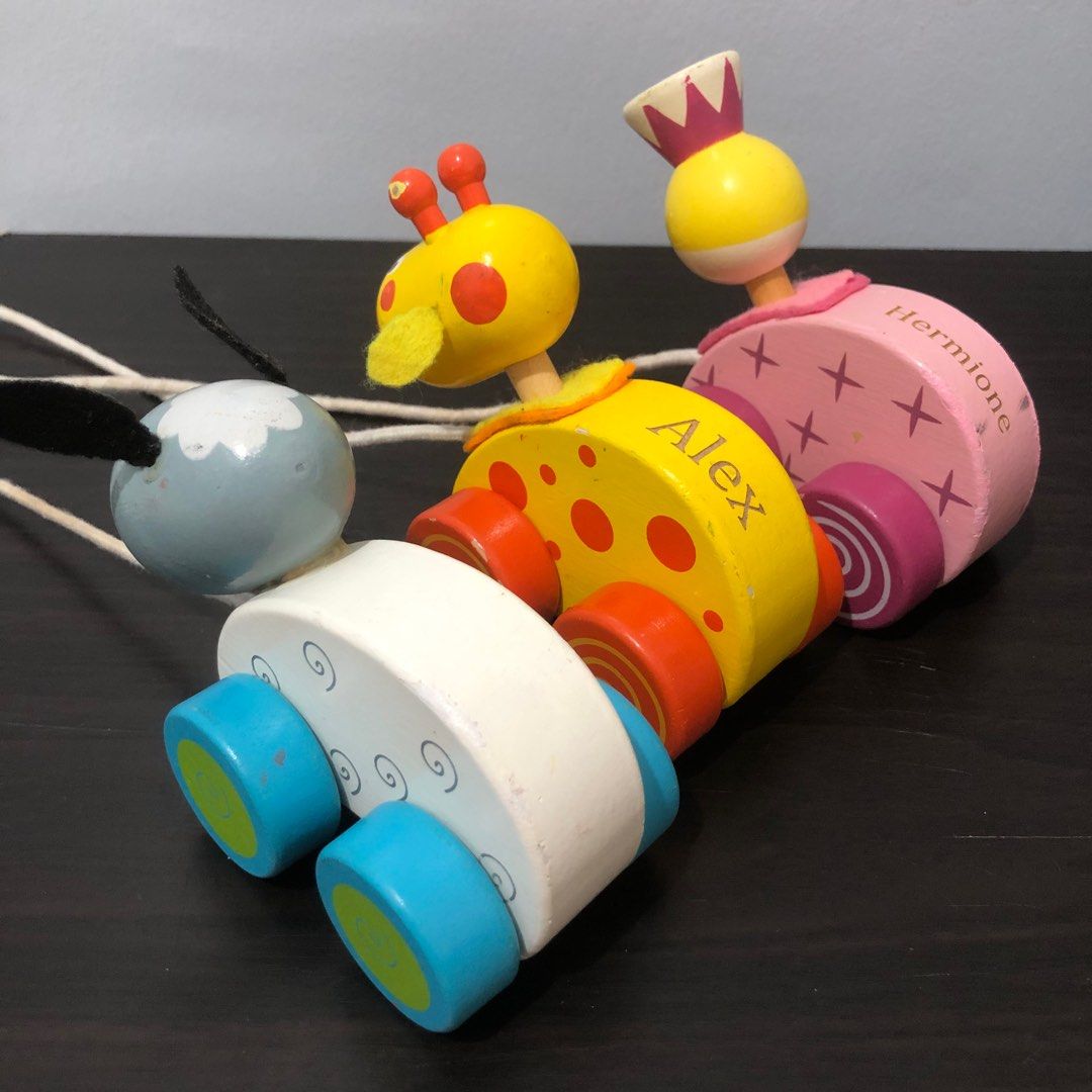 Small Wooden Pull Along Toys Bundle (Category: Infant Playtime) located in Imus. Submitted by dyelinn (Listing ID 1383221644, Image 2). Description: Take all ₱180 AS IS with signs of use, paint chips.