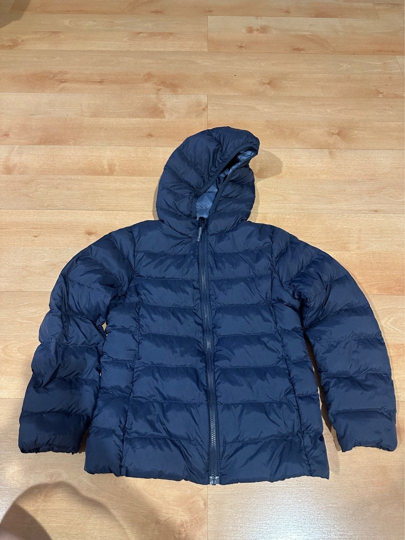 Uniqlo puffy winter jacket (Category: Babies & Kids Fashion) located in Ipoh. Submitted by bubblymermaid (Listing ID 1383142710, Image 1). Description: Size 130cm.
