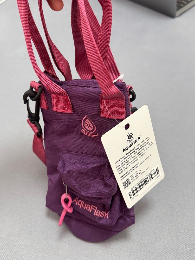 AquaFlask Carry Bag Authentic fits 22oz Bottle (Category: Water Bottles & Tumblers) located in Manila. Submitted by alliev515 (Listing ID 1383353806, Image 3). Description: Bnew, never been used (still smells new) Pink & Violet color toned. Cute carry bag for your aquaflask bottle and ideal for everyday use..