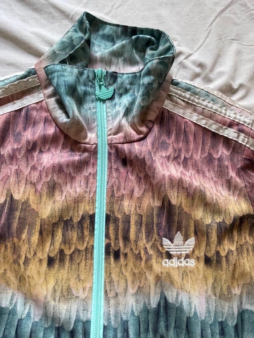 Authentic Adidas jacket (Category: Coats, Jackets and Outerwear) located in Quezon City. Submitted by RoxyB (Listing ID 1383293730, Image 2). Description: Preloved authentic Adidas jacket. Size S. Lightly used. RFS: Decluttering .