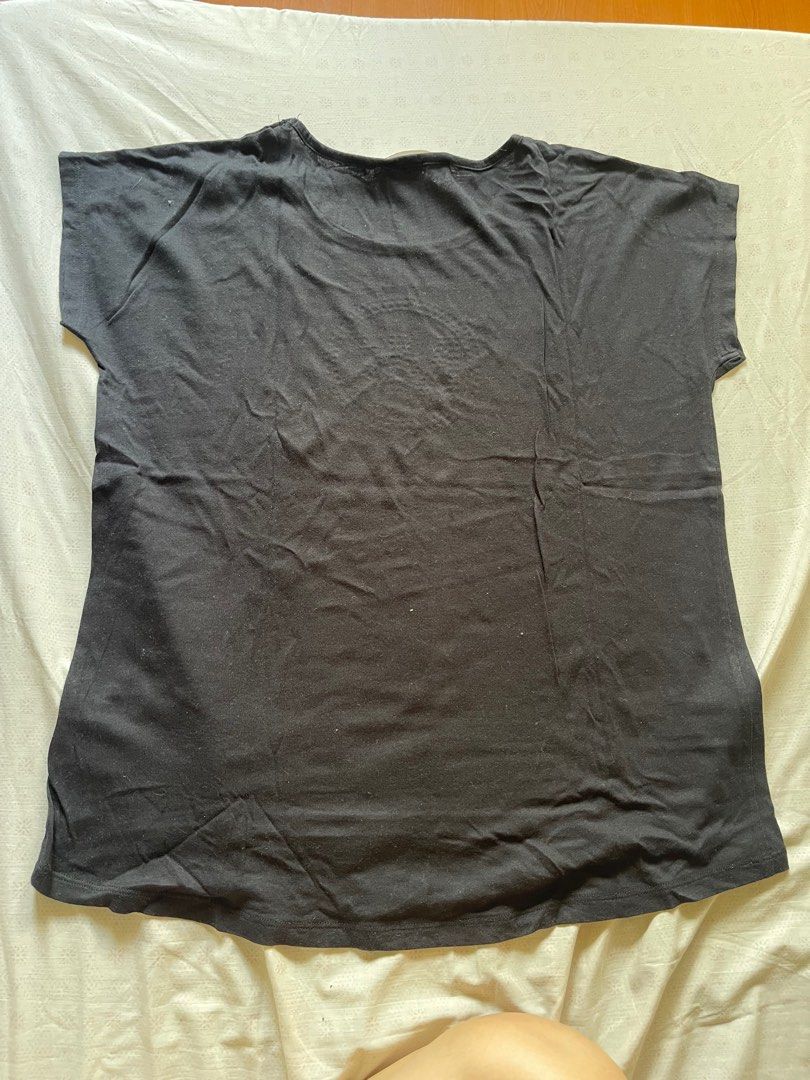 Authentic Michael Kors T-shirt (Category: Shirts) located in Quezon City. Submitted by RoxyB (Listing ID 1383312083, Image 2). Description: Preloved MK black t-shirt. Fits S-M. In very good condition. Used twice only. RFS: Decluttering .