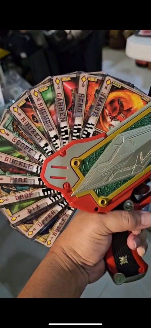 Bandai DX Garren Rouzer - Authentic Bandai (Category: Action & Battle Toys) located in Singapore. Submitted by starwarskid (Listing ID 1383281878, Image 3). Description: Authentic Bandai DX Garren Rouzer from Bandai. Includes the Rouze Cards. A great collectible for Kamen Rider fans! Do PM me for videos of it working .
