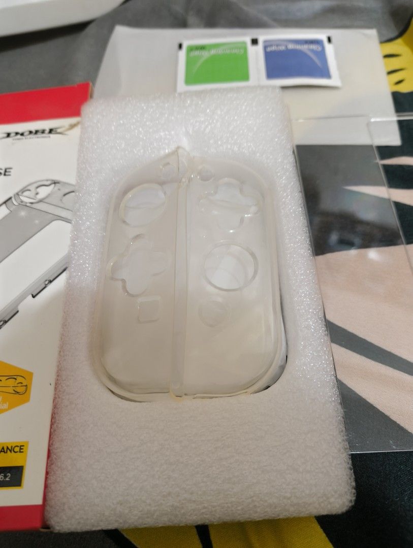 Dobe Nintendo Switch Oled Transparent Case (Category: Nintendo) located in Manila. Submitted by _mitsurikanroji (Listing ID 1383445195, Image 2). Description: NS Oled case with free tempered glass ₱99 only! ₱99 only! MOP: Gcash MOD: Lalamove or Grab (c/o buyer) location: Near LRT Tayuman Station.
