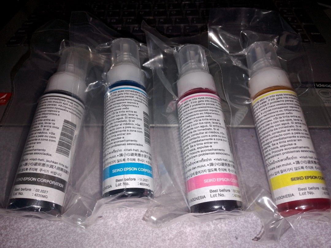 Epson Original Dye Ink (Category: Printers, Scanners & Copiers) located in Pasig City. Submitted by symone8 (Listing ID 1383285073, Image 3). Description: Take all CMYK Dye Ink original from Epson L121 printer. I used pigment for my printer. Buyer's expense on the shipping.