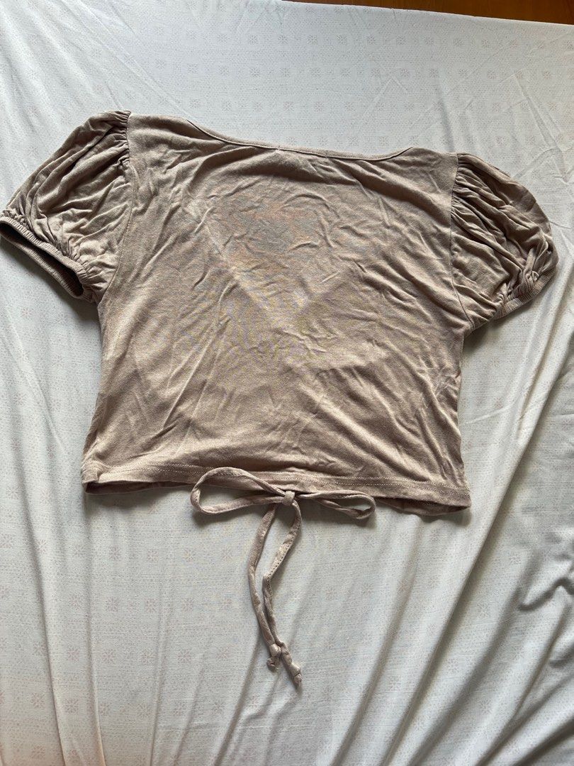 Forever 21 beige/nude top with adjustable string (Category: Others Tops) located in Quezon City. Submitted by RoxyB (Listing ID 1383295942, Image 2). Description: Preloved Forever 21 nude color top with adjustable string. This can be turned into a crop top when strings are adjusted. Fits XS-S RFS: Decluttering .