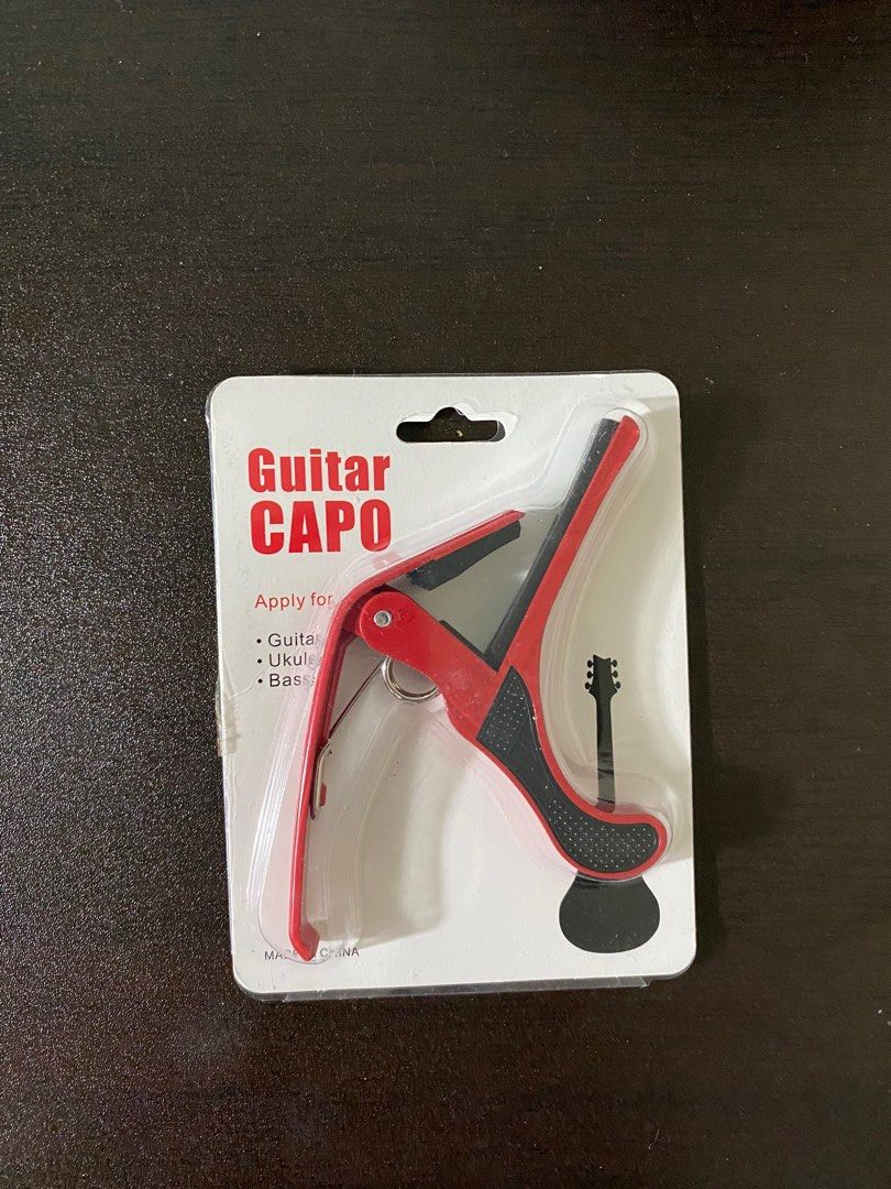 Guitar Capo (Category: Musical Instruments) located in Cebu City. Submitted by geez_md (Listing ID 1383462632, Image 1). Description: Spare. Unused.