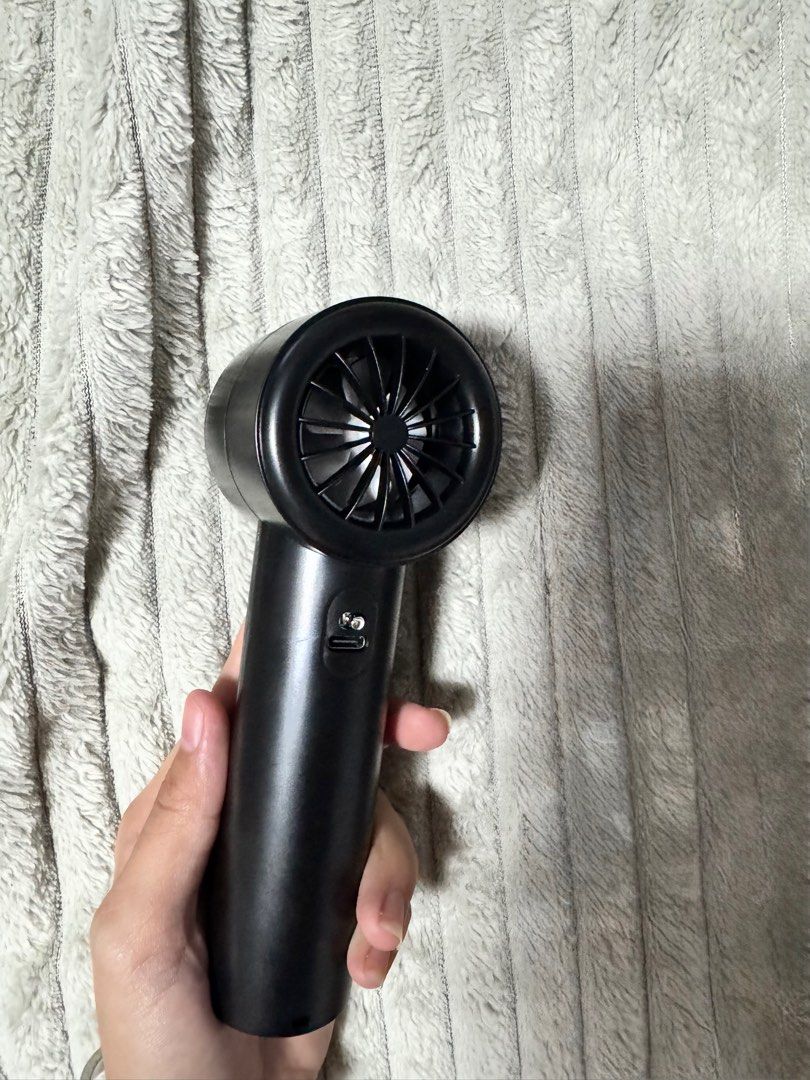 Handheld Minifan (Black) (Category: Fans) located in Marikina City. Submitted by deecluters (Listing ID 1383463135, Image 3). Description: MOP: GCASH MOD: LALAMOVE (Open to other courier services as well as long as arranged by buyer) LOCATION: MARIKINA HEIGHTS.