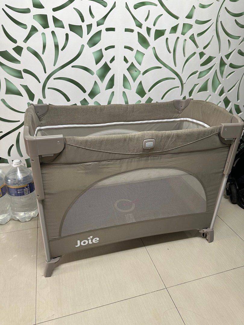 Joie Kubbie Sleep Bedside Crib (Category: Cots & Cribs) located in Manila. Submitted by mryjneng19 (Listing ID 1383276123, Image 1). Description: Joie Kubbie Sleep preloves Lightly Used - used for only 3 weeks Light Stain on handle Side panel slides up or down with the push of a button and with just one hand to give you easy access to baby Full size bassinet removes and attaches easily letting you effortlessly move between naptime and playtime an