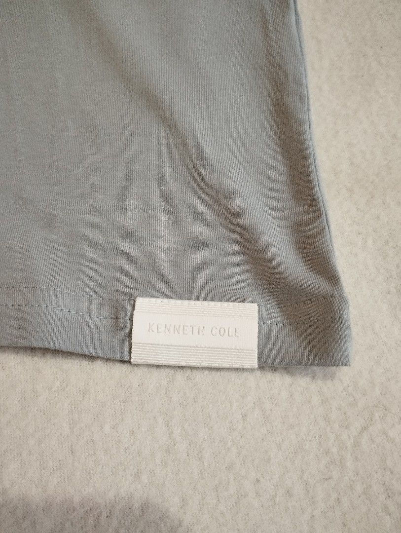Kenneth Cole shirt (Category: Tshirts & Polo Shirts ) located in Cebu City. Submitted by limeracing (Listing ID 1383280479, Image 3). Description: For sale Kenneth Cole shirt M-L, dimensions W21.5 L28 Brand new with tag Padala from US Selling for 650 RFS: doubles 📍 Cebu MOP: GCash or BPI online transfer.
