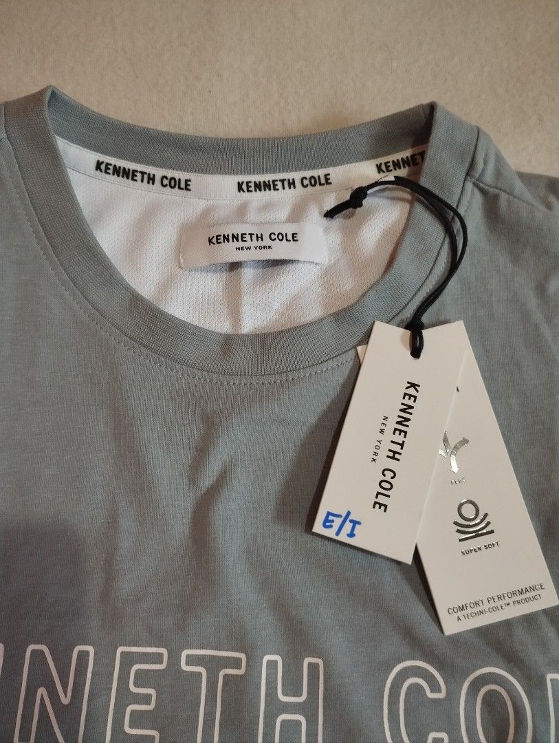 Kenneth Cole shirt (Category: Tshirts & Polo Shirts ) located in Cebu City. Submitted by limeracing (Listing ID 1383280479, Image 2). Description: For sale Kenneth Cole shirt M-L, dimensions W21.5 L28 Brand new with tag Padala from US Selling for 650 RFS: doubles 📍 Cebu MOP: GCash or BPI online transfer.
