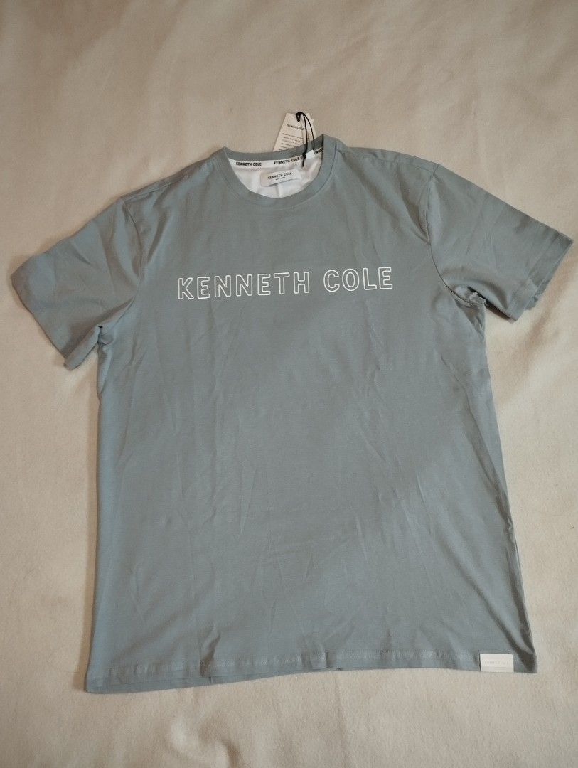 Kenneth Cole shirt (Category: Tshirts & Polo Shirts ) located in Cebu City. Submitted by limeracing (Listing ID 1383280479, Image 1). Description: For sale Kenneth Cole shirt M-L, dimensions W21.5 L28 Brand new with tag Padala from US Selling for 650 RFS: doubles 📍 Cebu MOP: GCash or BPI online transfer.