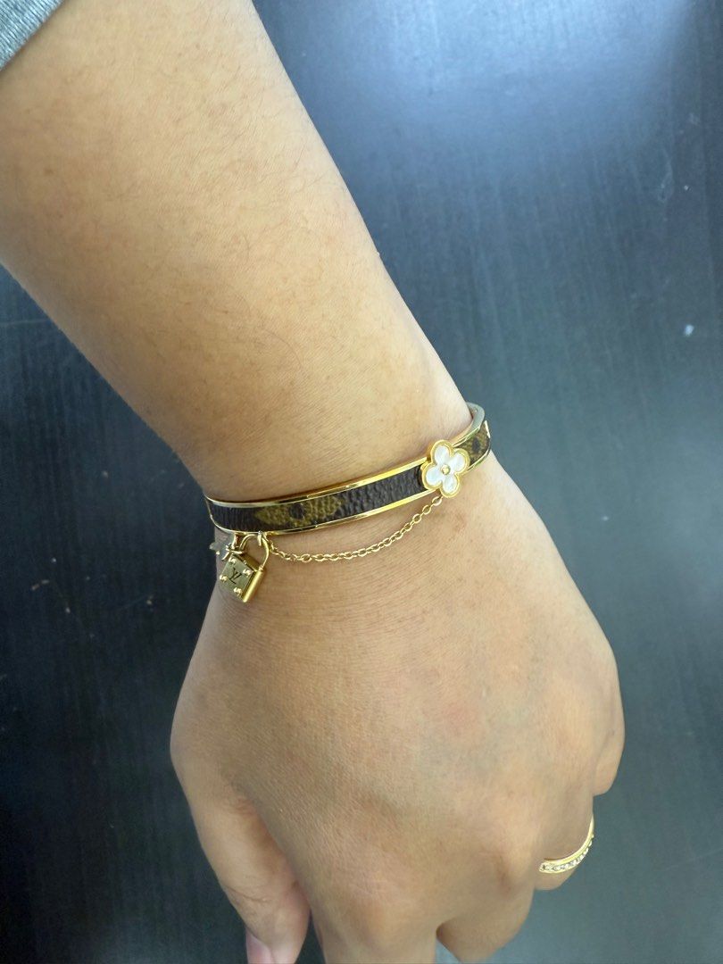 LV Bangle (Category: Bracelets) located in Kuala Lumpur. Submitted by secondstory.studio (Listing ID 1383282913, Image 1). Description: LV Bangle Authenticity: Not an original LV design, but crafted using authentic Louis Vuitton leather. Condition: Like new – worn only 2-3 times on special occasions. Well cared for. Size: Approximately 6cm in diameter (refer to attached photo for reference). Price: RM95 (postage not included) .
