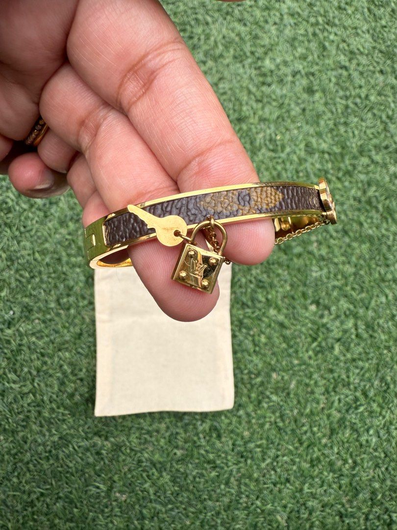 LV Bangle (Category: Bracelets) located in Kuala Lumpur. Submitted by secondstory.studio (Listing ID 1383282913, Image 3). Description: LV Bangle Authenticity: Not an original LV design, but crafted using authentic Louis Vuitton leather. Condition: Like new – worn only 2-3 times on special occasions. Well cared for. Size: Approximately 6cm in diameter (refer to attached photo for reference). Price: RM95 (postage not included) .