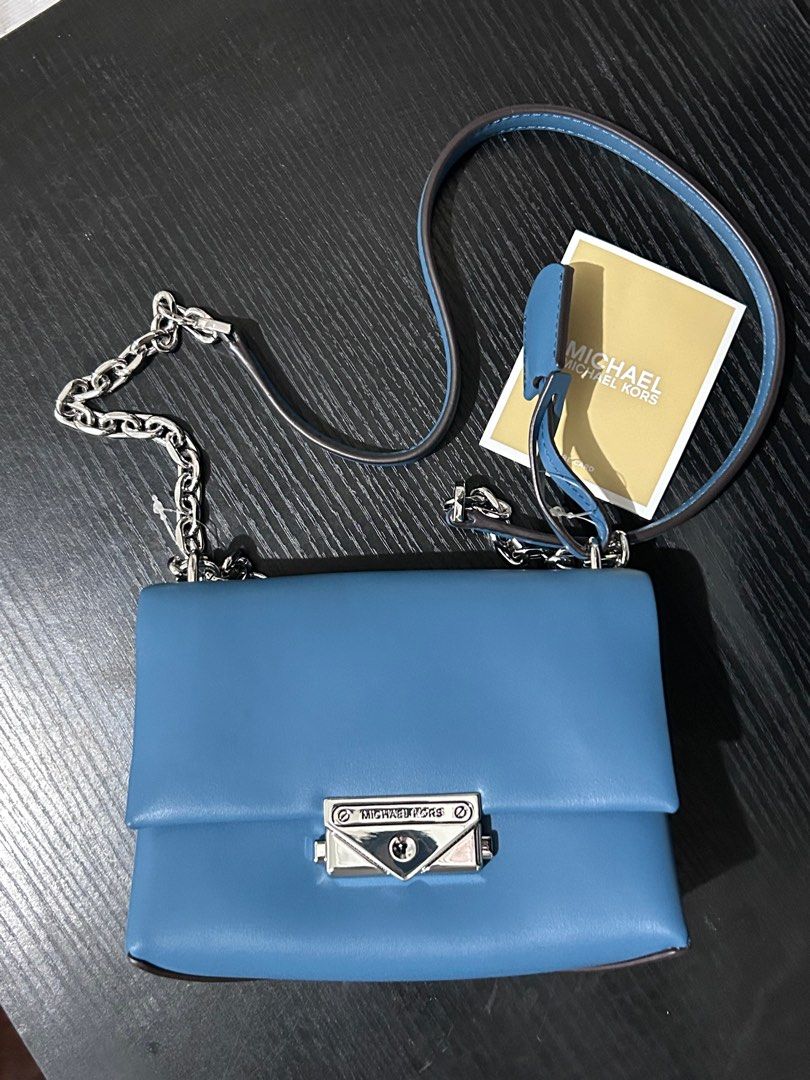 Michael Kors Cece Small Convertible Flap Crossbody (Category: Cross-body Bags) located in San Marcelino. Submitted by sainthustle (Listing ID 1383333617, Image 2). Description: Convertible Flap Crossbody Teal in color Non-leather vegan material.
