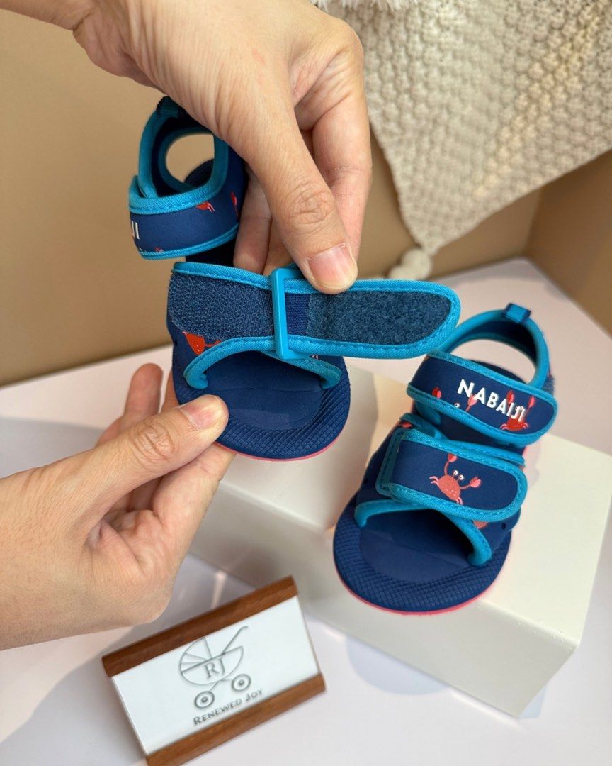 NABAIJI baby swimming sandals (Category: Babies & Kids Fashion) located in Kuala Lumpur. Submitted by renewedjoymy (Listing ID 1383420515, Image 3). Description: NABAIJI baby swimming sandals | KF004 🍼 pool sandals for small children walking around the pool or near water 🍼 comfortable, lightweight, with a colourful print are designed to keep the foot firmly in place, thanks to the 2 rip-tab straps 🍼 grooved sole for grip on the ground 🍼 size 