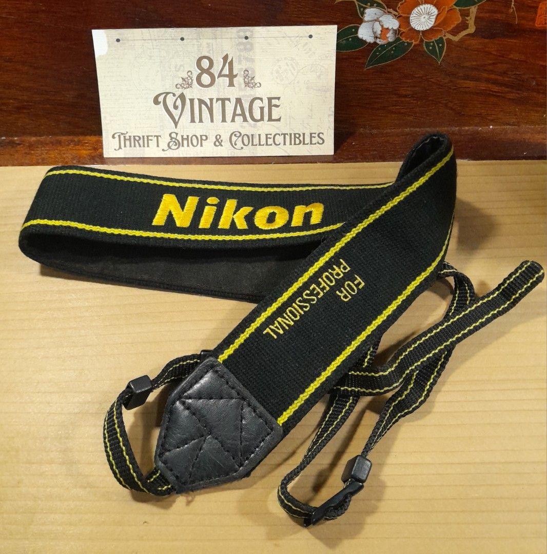 Nikon Camera Strap (wide black) (Category: Camera Bags & Carriers) located in Las Pinas. Submitted by 84vintage (Listing ID 1383435198, Image 1). Description: Metal Buckles, Wide strap Actual photos posted. Please examine them carefully as they are part of the description. --📌 MUST READ Before Dealing with us 📌-- ⚠️Price is posted. No lowballs please. ⚠️Vintage items are only sold As Is Where Is. If you want new items without any flaws, you can