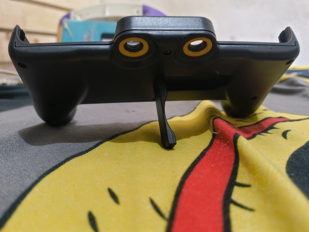 Nintendo 2DS XL handgrip and Pouch (Category: Nintendo) located in Manila. Submitted by _mitsurikanroji (Listing ID 1383445685, Image 3). Description: Nintendo 2ds xl grip with red pouch Natago lang. Good condition. Wala na 2ds kaya benta na. MOP: Gcash MOD: Lalamove or Grab (c/o buyer) location: Near LRT Tayuman Station.