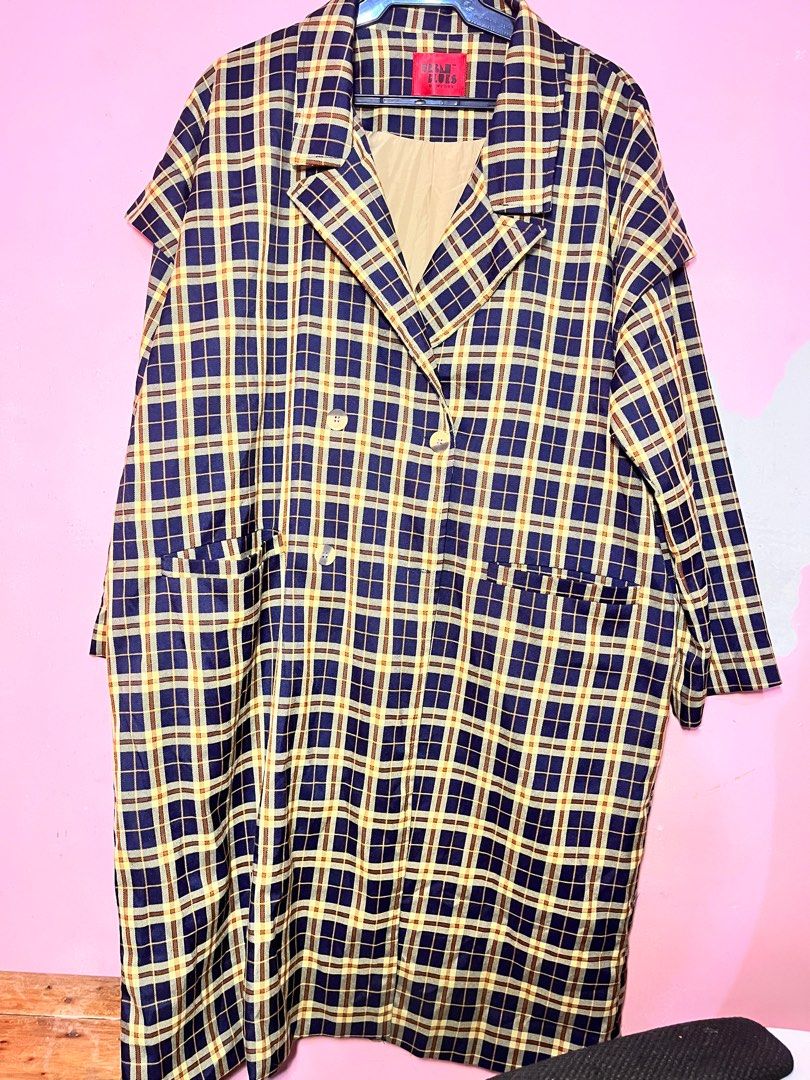 Plaid trench coat (Category: Coats, Jackets and Outerwear) located in Cavite. Submitted by sage21 (Listing ID 1383305222, Image 1). Description: • Double-breasted button closure • Wide lapel collar • Plaid pattern (navy blue with yellow and red lines) • Long and loose fit • Pockets on the front.
