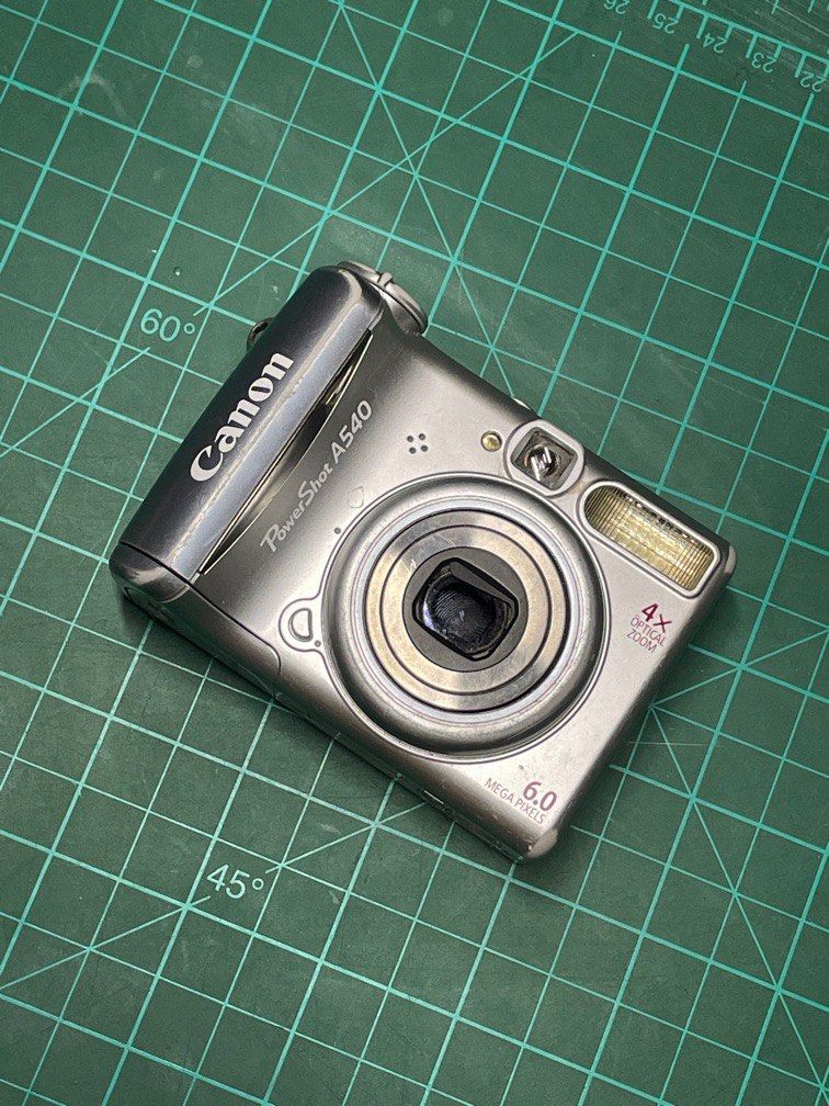 Tested Canon A540 (Category: Cameras) located in Talisay. Submitted by dararaki (Listing ID 1383457732, Image 1). Description: for parts/repair, camera is tested but lens stuck error. can be used for parts replacement as well. super responsive also (will send video) lcd screen - perfect condition body - scratches, no port cover buttons - crisp, faded dials battery compartment- no signs of rust flash - still works fine negotiable ship via jnt/lbc 