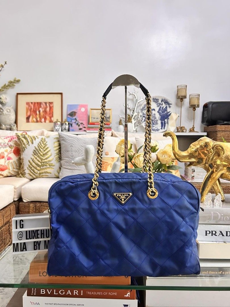 💯 % Authentic Prada Nylon Tessuto Bag (Category: Luxury Bags & Wallets) located in Paranaque City. Submitted by luxehuntsmla.bymari (Listing ID 1383562918, Image 1). Description: 💯 % Authentic Prada Nylon Tessuto Bag 🔸Darkened in some parts ( kayo na nagpa spa) 🔸 NO corner scuffs, tears, or foul smell. 🔸 excellent gold hardware 🔸 clean inside Php 13500 only FIXED 🔘🔘🔘 All items posted are guaranteed authentic or your money-back if proven 