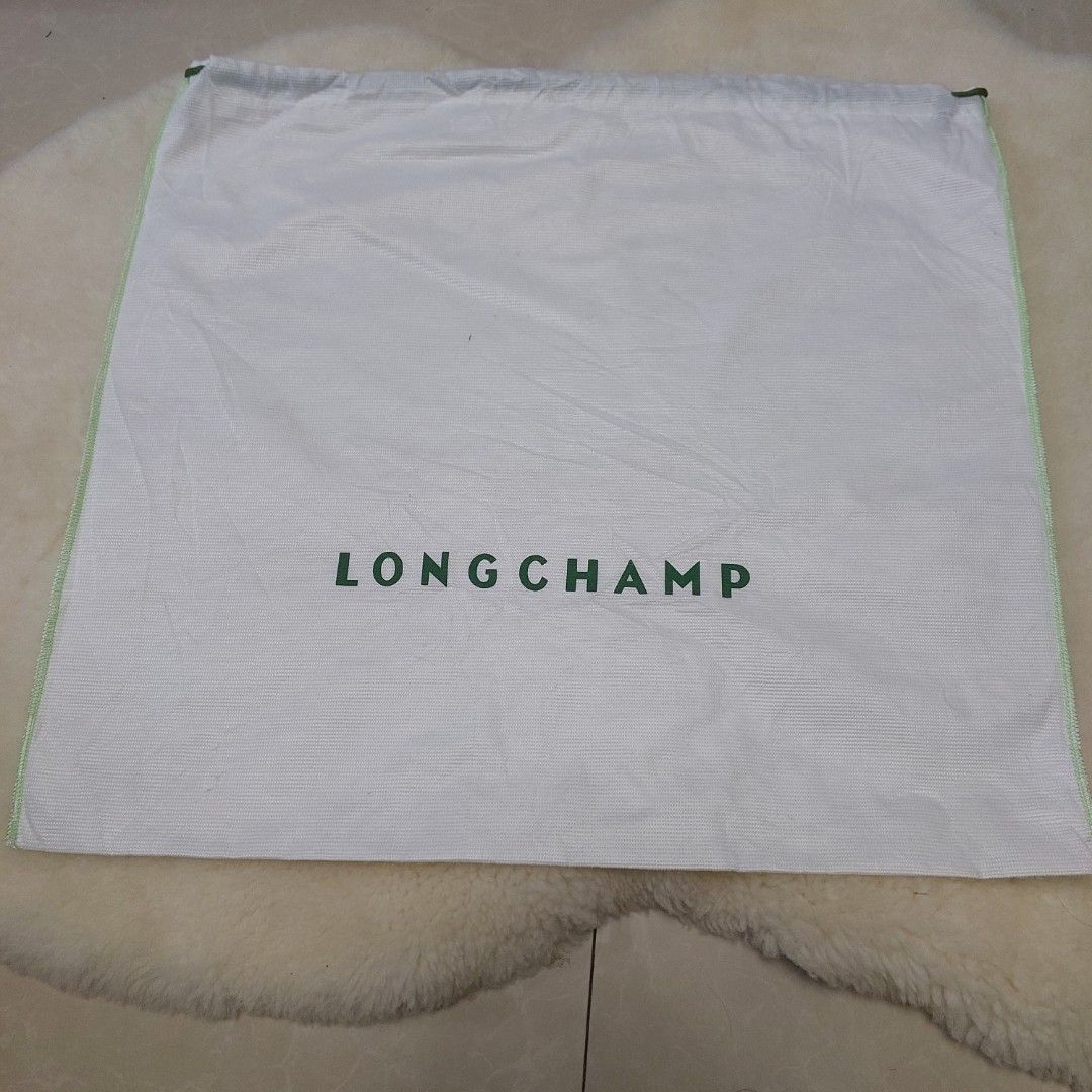 Authentic Longchamp dust bag 18.5x21 inches (Category: Luxury Bags & Wallets) located in Manila. Submitted by jfluxury.co (Listing ID 1383652407, Image 2). Description: excellent condition no flaws bought in Japan 🇯🇵 💯% Authentic. 😊 Money back guarantee. 😊 Clean and ready to use na..